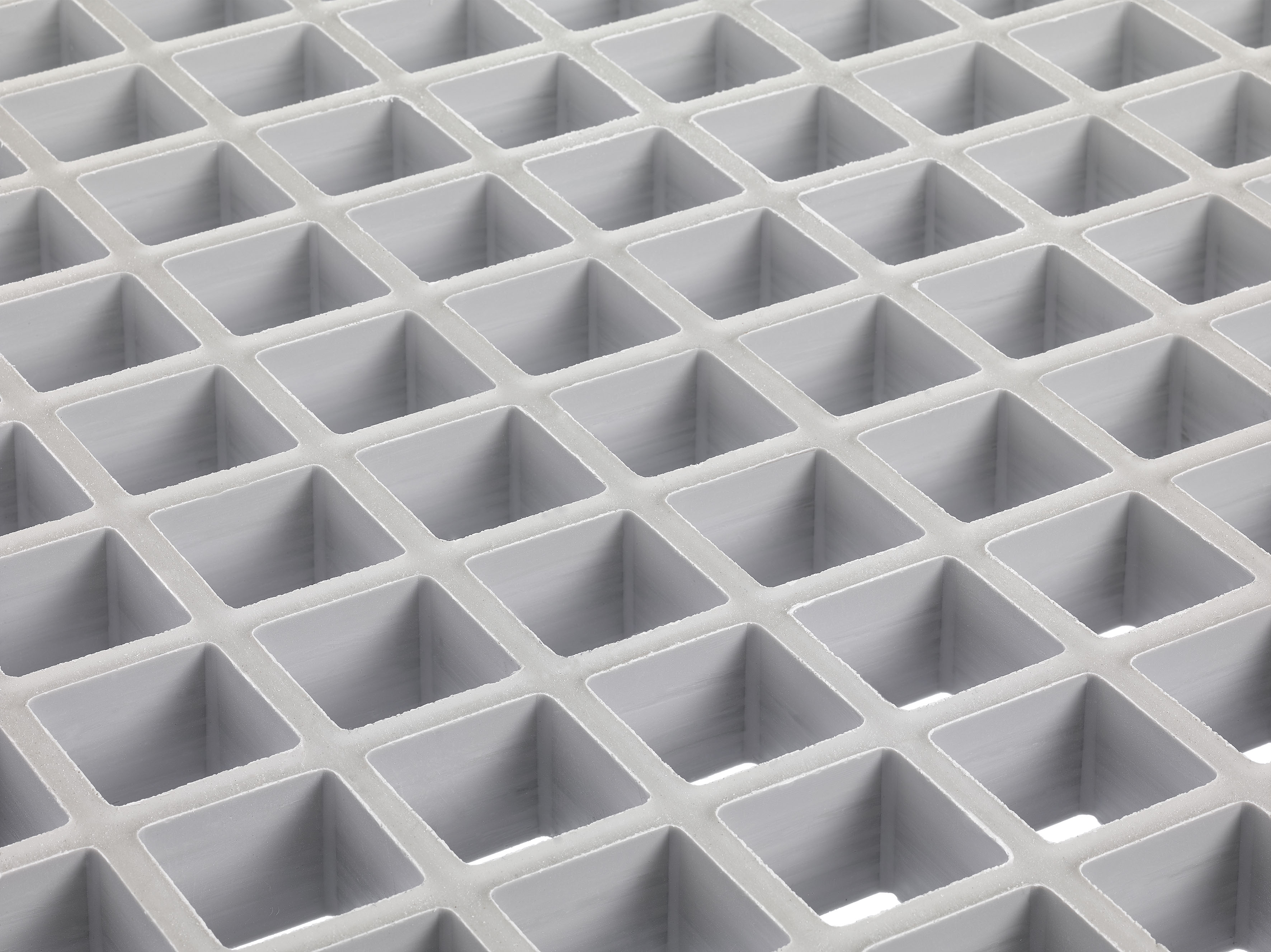 Illustrasjon av GRP gitterrist med glassfibre og gitterstruktur
